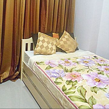 Air Conditioned fully furnished one bedroom unit with Edsa view Double bed with pull out bed May cook in our kitchen with complete dining wares Enjoy cabled TV & fast internet with wifi